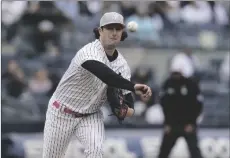  ?? AP PHOTO/SETH WENIG ?? New York Yankees starting pitcher Gerrit Cole throws to first base during the sixth inning of the first game of a baseball double-header against the Texas Rangers at Yankee Stadium, on Sunday.