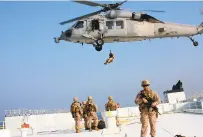  ?? CPL. TANNER A. GERST/U.S. MARINE CORPS ?? The Fleet Anti-Terrorism Security Team embarked aboard the Arc Liberty.