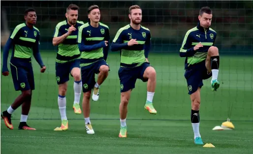  ?? AFP ?? Arsenal’s players during a training session at London Colney ground ahead of their Champions League Group A match against Basel. —