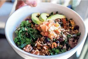  ?? ARIEL COBBERT/THE COMMERCIAL APPEAL ?? An El Goodo hearty bowl made with sliced avocado, diced Roma tomatoes, Serrano peppers, cilantro, yellow onion, pressed garlic, lemon, black and kidney beans and moreat City Silo Table + Pantry.