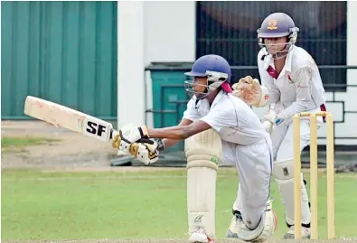  ??  ?? Kotte Thomian Tharuka Dilshan sweeps in their big match against Sri Jayewarden­epura MV - Pic by Ranjith Perera