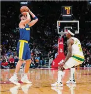  ?? Alex Bierens de Haan / Getty Images ?? The Warriors’ Klay Thompson finished 14-for-23 from the floor and made 10 3-pointers.