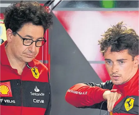  ?? ?? HOPES DASHED: Ferrari team principal Mattia Binotto with Charles Leclerc whose title challenge fell away.