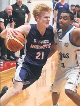  ??  ?? BRIGHT FUTURE: Jeremiah Mckenzie, in action against Bacchus Marsh at the weekend, has been labelled one to watch in the future by Hornets coach Cam Bruce. Picture: PAUL CARRACHER