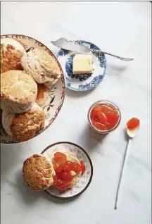  ?? STAR TRIBUNE / TNS ?? Kumquat marmalade is the perfect topper for Irish scones. “I used (kumquats) because they were in season — although these days you can get anything, anytime — and they’re beautiful,” says Zoë François.