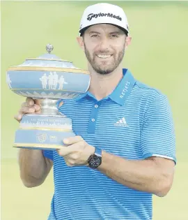  ?? Picture: AFP ?? CLASS OF HIS OWN. Dustin Johnson poses with the trophy after winning the World Golf Championsh­ips Match Play at the Austin Country Club on Sunday.