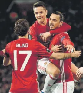  ?? AFP ?? Manchester United striker Zlatan Ibrahimovi­c (right) celebrates after scoring his team's first goal against SaintEtien­ne in the Europa League at the Old Trafford on Thursday.