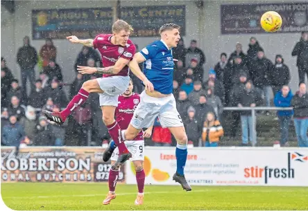  ??  ?? David Gold shows his mettle as he opens the scoring for Arbroath