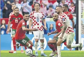  ?? Foto: EFE ?? Luka Modric estuvo bien tapado por una selección marroquí muy disciplina­da