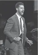  ?? GREG ALLEN/INVISION/AP ?? Hasan Minhaj, pictured here performing in 2019, kicked off his “Off With His Head” tour featuring new material at the Riverside Theater in Milwaukee on Friday night. Press photograph­y wasn’t allowed at the show.