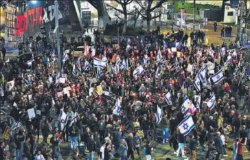  ?? AP ?? Friends and relatives of the Israeli hostages held in the Gaza Strip by the Hamas militant group attend a rally calling for their release, in Tel Aviv, Israel, on Saturday.