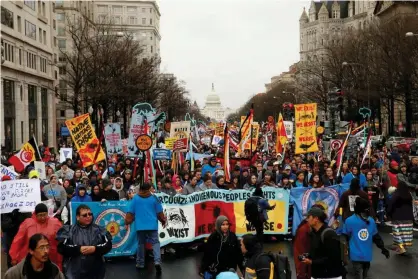  ?? Photograph: Kevin Lamarque/Reuters ?? Indigenous leaders participat­e in a protest march and rally in opposition to the Dakota Accessand Keystone XL pipelines in Washington in 2017.