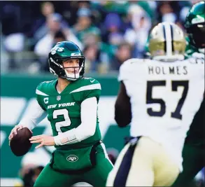  ?? Matt Rourke / Associated Press ?? The Jets’ Zach Wilson drops back to pass against the Saints on Sunday.