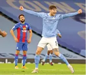  ?? (AFP) ?? Manchester City's John Stones celebrates after scoring against Crystal Palace during the English Premier League match on Sunday