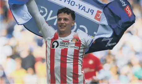  ?? ?? Nathan Broadhead celebrates Sunderland’s promotion.