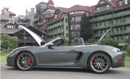  ?? MARC GRASSO PHOTOS / BOSTON HERALD ?? GORGEOUS: The curvy Porsche 718 Boxster is a fun way to get around, with a 4.0-liter six-cylinder engine that provides 394 horsepower and goes from zero to 60 in 4.3 seconds.