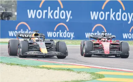  ?? REUTERS ?? Red Bull’s Max Verstappen, left, and Ferrari’s Charles Leclerc during the Emilia Romagna Grand Prix.