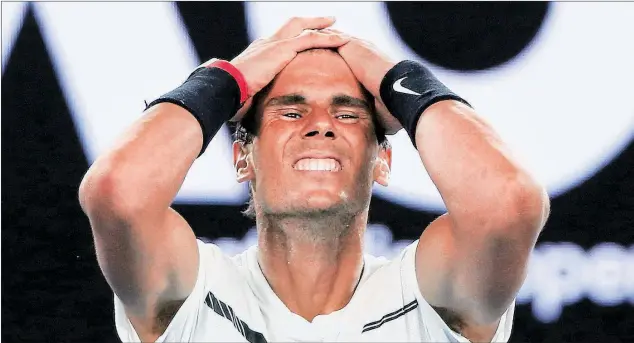  ?? Reuters/ap ?? Rafael Nadal slumps to the ground after beating Grigor Dimitrov in a gruelling five-setter that lasted four hours and fifty six minutes .