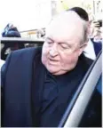  ?? AFP ?? Former Australian archbishop Philip Wilson leaves court in Newcastle on Tuesday.