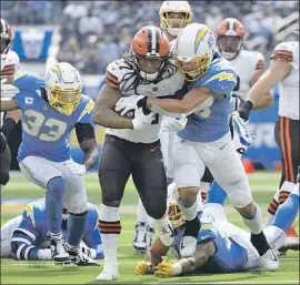  ?? Kevork Djansezian Associated Press ?? KAREEM HUNT and the Browns produced 230 yards rushing against the Chargers last weekend. The Chargers’ run defense is ranked last in the NFL.