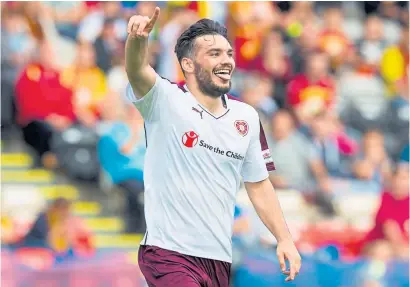  ??  ?? Tony Watt ensured Hearts earned all three points with his first goal for the club