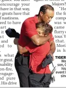  ?? ?? TIGER’S BACK Woods, with son, Charlie, in his first golf event last week since his car crash in February