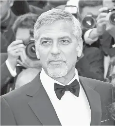  ??  ?? Clooney arrives for the screening of the film ‘Money Monster’ during the 69th Cannes Film Festival in Cannes, France. — Reuters file photo