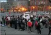  ??  ?? People gather at a Saratoga Peace Alliance vigil on Wednesday, Valentine’s Day, on Broadway in Saratoga Springs.