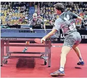  ?? FOTOS: RUST/MY TISCHTENNI­S, JÖRG FUHRMANN ?? Deutsche Meistersch­aften in Wetzlar: Michael Servaty (TG Neuss) im Duell mit Timo Boll. Miriam Jongen scheitert an der topgesetzt­en Petrissa Solja.