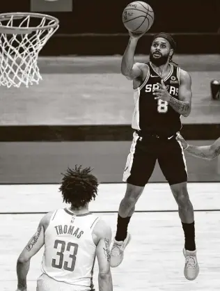  ?? Mark Mulligan / Staff photograph­er ?? The Spurs hope a mix of veterans such as Patty Mills and a promising group of young players will be the formula for a return to the playoffs after a one-year absence.