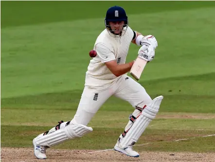  ?? GETTY IMAGES ?? Joe Root dominated the spinners in scoring 228 in England’s first innings against Sri Lanka yesterday.