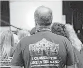  ?? Rodger Mallidson / Fort Worth Star-Telegram ?? Alternate delegate Leslie Wilkerson of Austin, who is part of the Texas Nationalis­t Group, stood out with his Alamo T-shirt during the 2014 Republican Convention in Fort Worth.