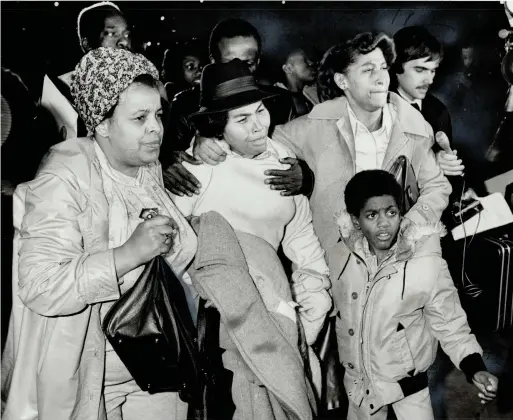  ?? JIM RUSSELL TORONTO STAR FILE PHOTO ?? Top photo:
Shouting and crying, Johnson’s widow, Lemona, along with relatives and friends, rushed from the courtroom as the jury acquitted two police officers who were charged with manslaught­er in the 35-year-old Jamaican immigrant's shooting death. Middle: During the investigat­ion of Albert Johnson’s death, police guard the Manchester Avenue house in the Christie Pits neighbourh­ood where he was shot.