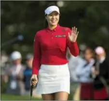  ?? ADRIAN WYLD — THE CANADIAN PRESS VIA AP ?? In Gee Chun acknowledg­es the gallery on the eighth hole during the second round of the Canadian Pacific Women’s Open in Ottawa, Ontario, Friday.