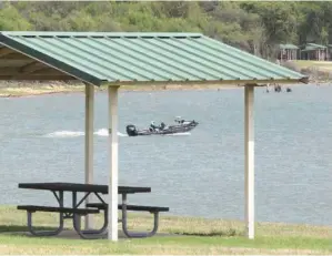  ??  ?? left A new pay station has been installed at Waco Lake Twin Bridges day use area,
which has popular swimming beaches in
Waco, Texas.