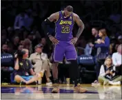  ?? SEAN M. HAFFEY — GETTY IMAGES ?? The Lakers’ LeBron James, dealing daily with ankle issues, missed his 10th game of the season on Tuesday.