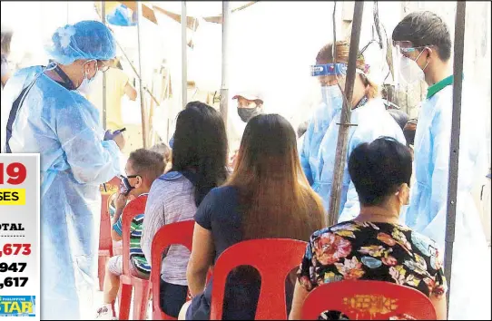  ?? EDD GUMBAN ?? Residents undergo mobile serology testing for COVID-19 at the Parola Compound in Tondo, Manila yesterday. The mobile serology testing clinics, launched by the city of Manila, will visit areas with high number of cases.
