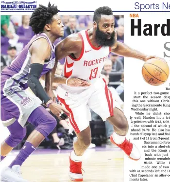  ??  ?? Houston Rockets guard James Harden, right, drives around Sacramento Kings defender DeAaron Fox during the first half of an NBA game in Sacramento, California Wednesday. (AP)