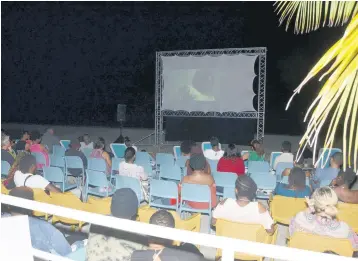  ??  ?? Movie-lovers watched the films on the beach during Skylark Film Nights in Negril last Saturday night.