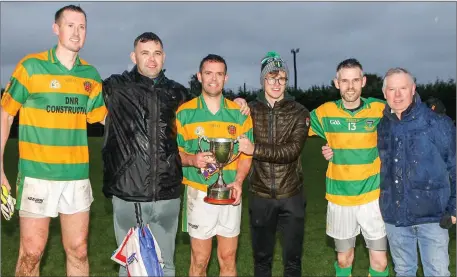  ??  ?? A family affair as members of the Relihan family celebrate after Abbey Rovers claimed the North Cork Junior B Football title by beating Grange in last weekend’s final in Glanworth. Photo by Eric Barry