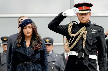  ?? AP ?? The decision to strip the Duke and Duchess of Sussex of their royal patronages and honorary military appointmen­ts leaves them free to focus on their media projects and product endorsemen­ts, but it is a significan­t blow to Harry, whose life has been intertwine­d with his military service and support of sport.