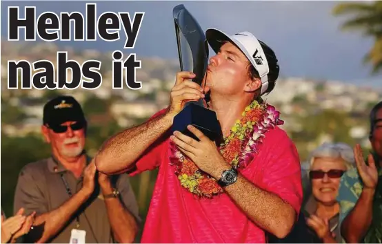  ?? AFP ?? Sweet taste of success: Russell Henley kisses the Sony Open trophy at the Waialae Country Club in Honolulu on Sunday. —