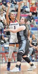  ?? Michelle Petteys, Heritage Snapshots ?? Heritage’s Aaliyah Rodgers shoots over Ridgeland’s McKensie Miller during their game last Tuesday. The Lady Generals won the matchup and entered this week riding a 10-game winning streak.