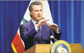  ?? Rich Pedroncell­i Associated Press ?? GOV. GAVIN NEWSOM’S initial plan would’ve trimmed $14 billion in spending, a cut to be reversed only if federal funds for coronaviru­s aid arrive this summer.