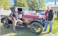  ?? ?? VINTAGE CAR MOTOR LOVER: Wooragee’s Joe Luisi - a mechanic by trade (left) with his restored 1922 Studebaker found found in Indigo Valley that had sat untouched in a shed for 47 years took around two years to do up chatted to Beechworth’s Howard Moreton.