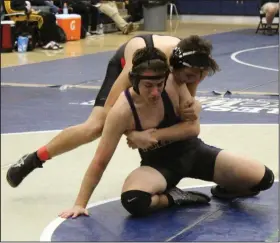  ?? MIKE BUSH/NEWS-SENTINEL ?? Tokay's Cameron Senner tries to break the grasp of Lincoln's Adam Cearly in their seventh place match at the Sac-Joaquin Section Division II wrestling tournament at Gregori High in Modesto on Saturday.