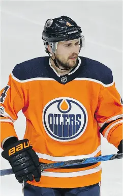  ?? LARRY WONG / POSTMEDIA ?? An own-goal by Oilers defenceman Kris Russell spared the Leafs from having to face the speedy Connor McDavid in a 3- on-3 overtime on Thursday night in Edmonton.