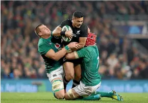  ??  ?? Richie Mo’unga attracts the attention of two Irish loose forwards in Dublin, creating room wider out.