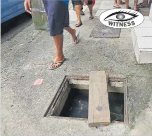  ?? Picture: SOPHIE RALULU ?? This uncovered manhole at Raojibhai Patel St, Suva poses a danger to unsuspecti­ng pedestrian­s and needs to be fixed.