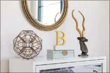  ?? DESIGN RECIPES ?? Brass accessorie­s, one of the hottest finishes in home decor, can be impactful when paired together.